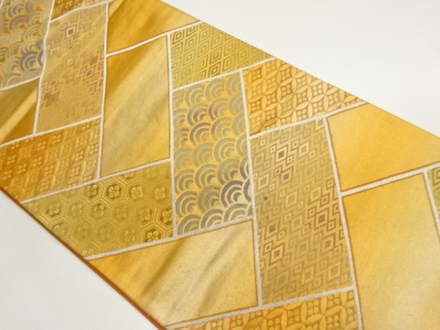 檜垣に古典柄模様織出し袋帯